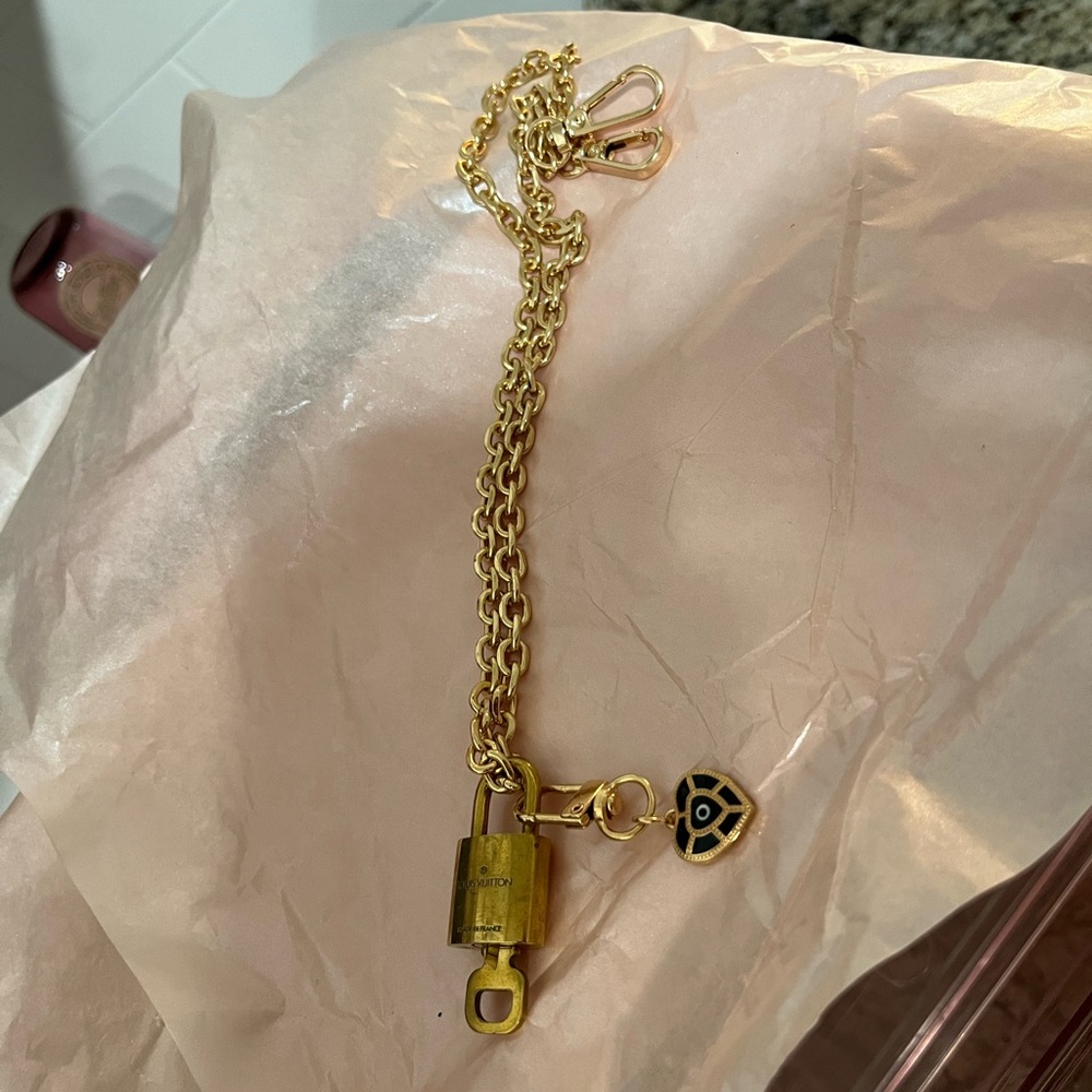 Lock And Key On Chain With A Charm - image 1